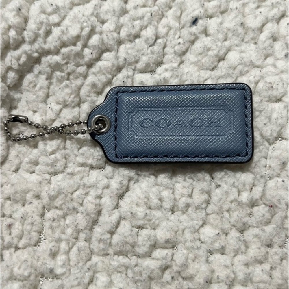 Coach light blue hang tag